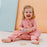 Nest Designs Short Sleeve Footed Sleep Bag 0.6Tog - Pink Sunset
