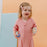 Nest Designs Short Sleeve Footed Sleep Bag 0.6Tog - Pink Sunset