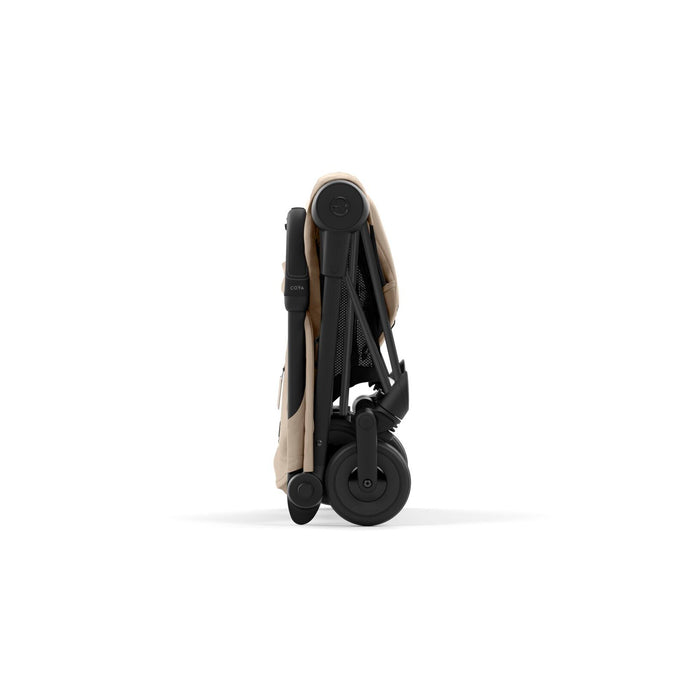 Cybex Coya Onebox - Black Frame/Cozy Beige Seat